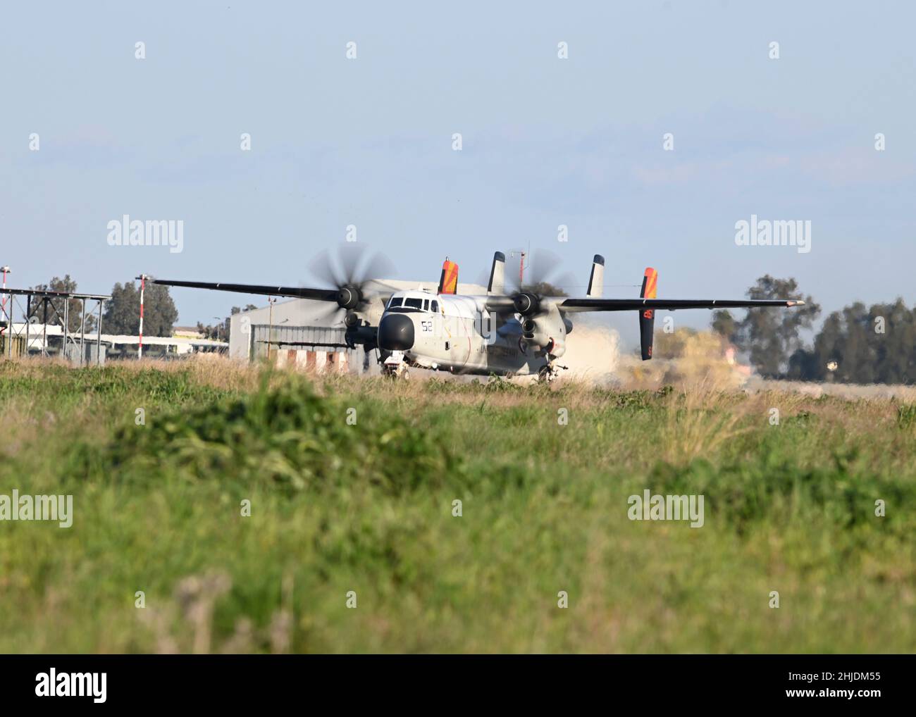 220126-N-UJ449-1023 NAVAL AIR STATION SIGONELLA, Italy (Jan. 26, 2022)—A C-2A Greyhound, assigned to Fleet Logistics Support Squadron (VRC) 40 attached to the USS Harry S. Truman Carrier Strike Group taxi on the runway on Naval Air Station Sigonella after landing, Jan. 26, 2022. NAS Sigonella’s strategic location enables U.S., allied, and partner nation forces to deploy and respond as required, ensuring security and stability in Europe, Africa and Central Command. (U.S. Navy photo by Mass Communication Specialist 2nd Class Josh Coté) Stock Photo