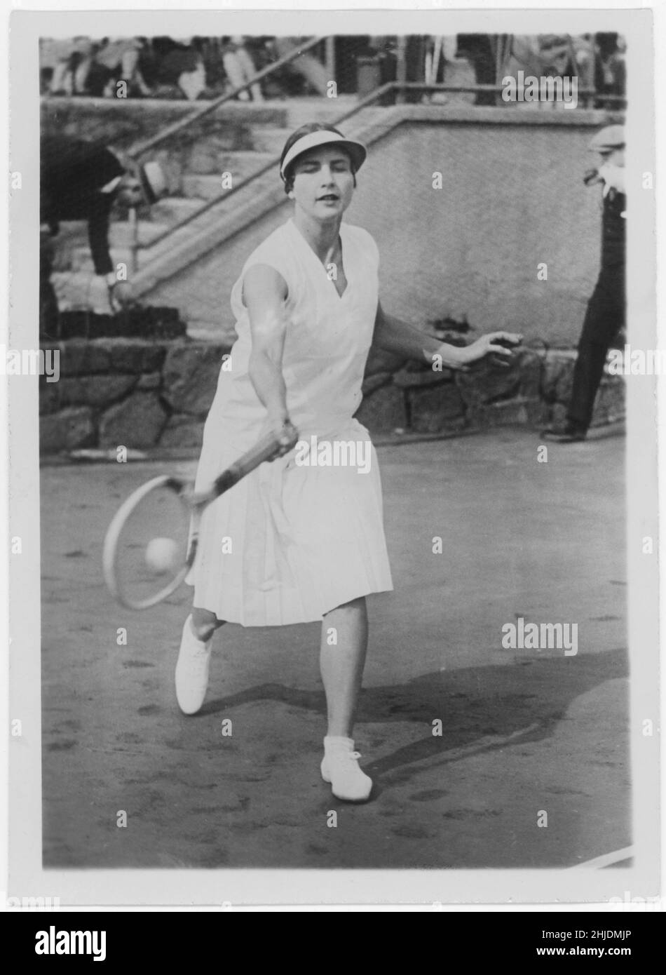 Helen Wills. American teenis player. October 6 1905 - Januari 1 1998. Also known by her married names Helen Wills Moody and Helen Wills Roark. She became famous for holding the top position in women's tennis for a total of nine years: 1927–33, 1935 and 1938. She won 31 Grand Slam tournament titles (singles, doubles, and mixed doubles) during her career, including 19 singles titles. Wills was the first American woman athlete to become a global celebrity, making friends with royalty and film stars despite her preference for staying out of the limelight. She was admired for her graceful physique Stock Photo
