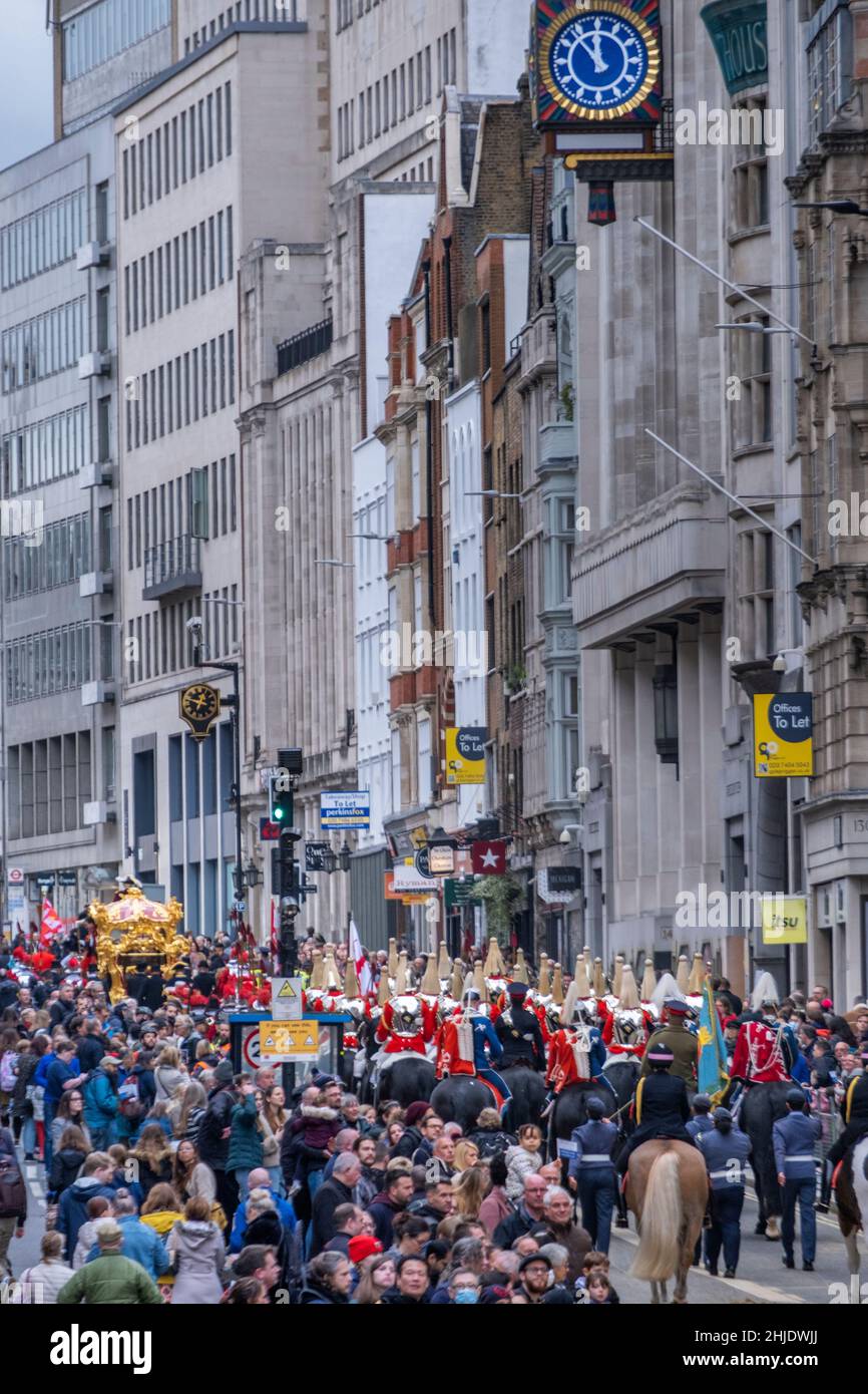 The Lord Mayor's coach and mounted Life guards of the Queens Household Division cavalry at the Lord Mayor's Show 2021, Fleet Street, London, UK Stock Photo