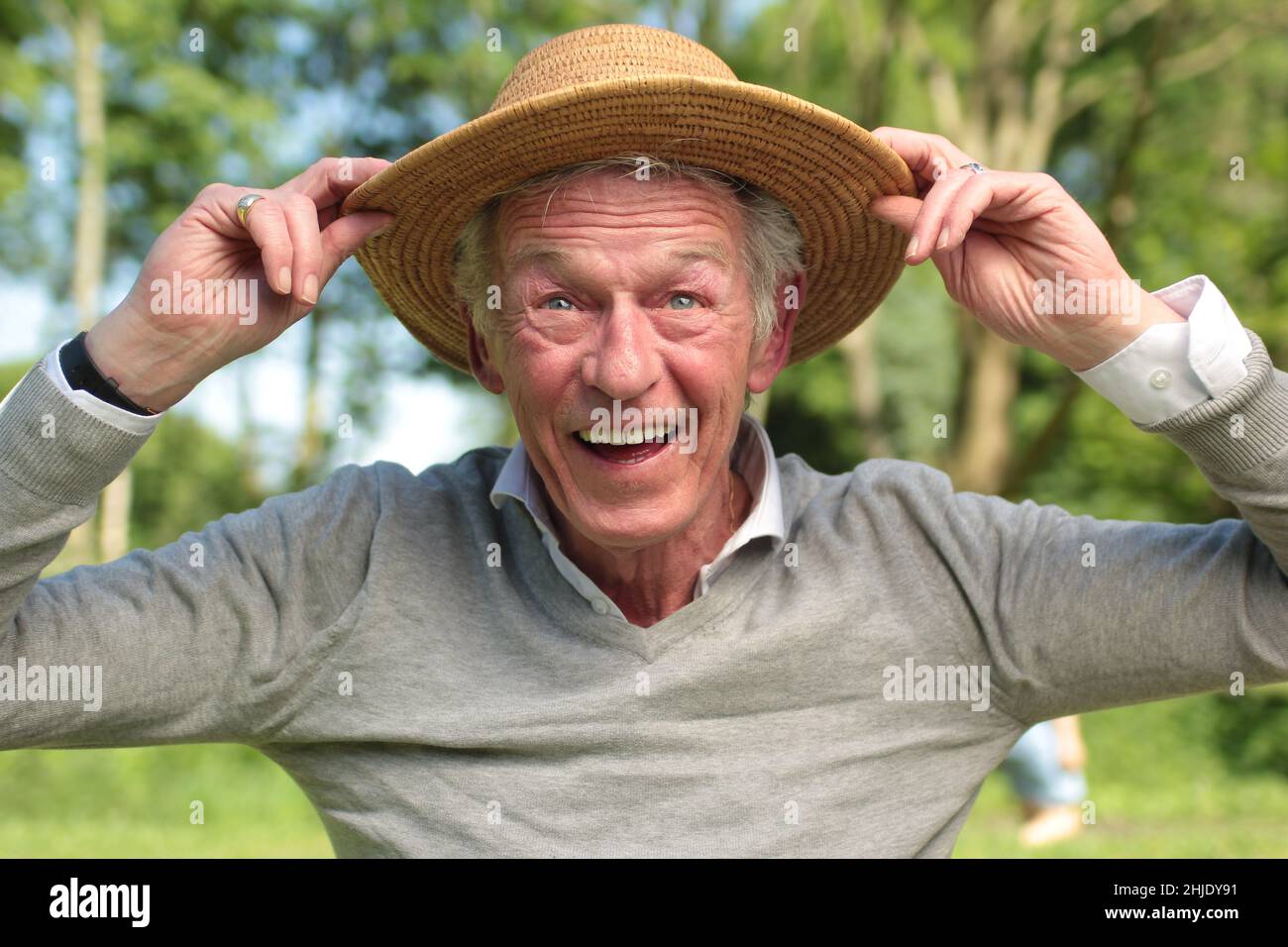 Beautiful old man outside Stock Photo