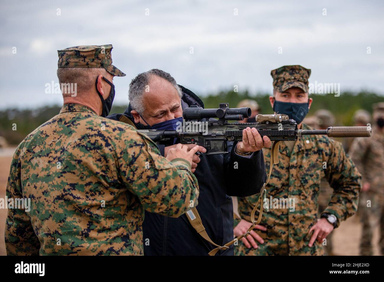 Camp Lejeune, United States. 28th Jan, 2022. U.S. Secretary of the Navy Carlos Del Toro is show how to fire a M27 Infantry Automatic Rifle during a visit to the live fire range with the II Marine Expeditionary Force, January 28, 2022 at Camp Lejeune, North Carolina. Credit: LCpl. Ryan Ramsammy/US Marines/Alamy Live News Stock Photo