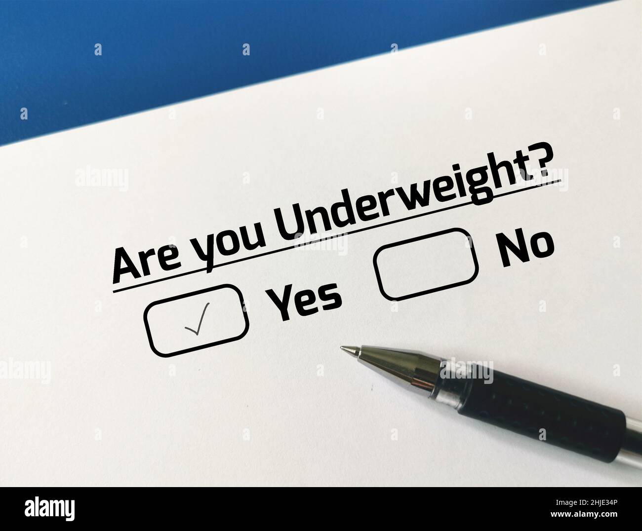One person is answering question about health problem. The person is underweight. Stock Photo