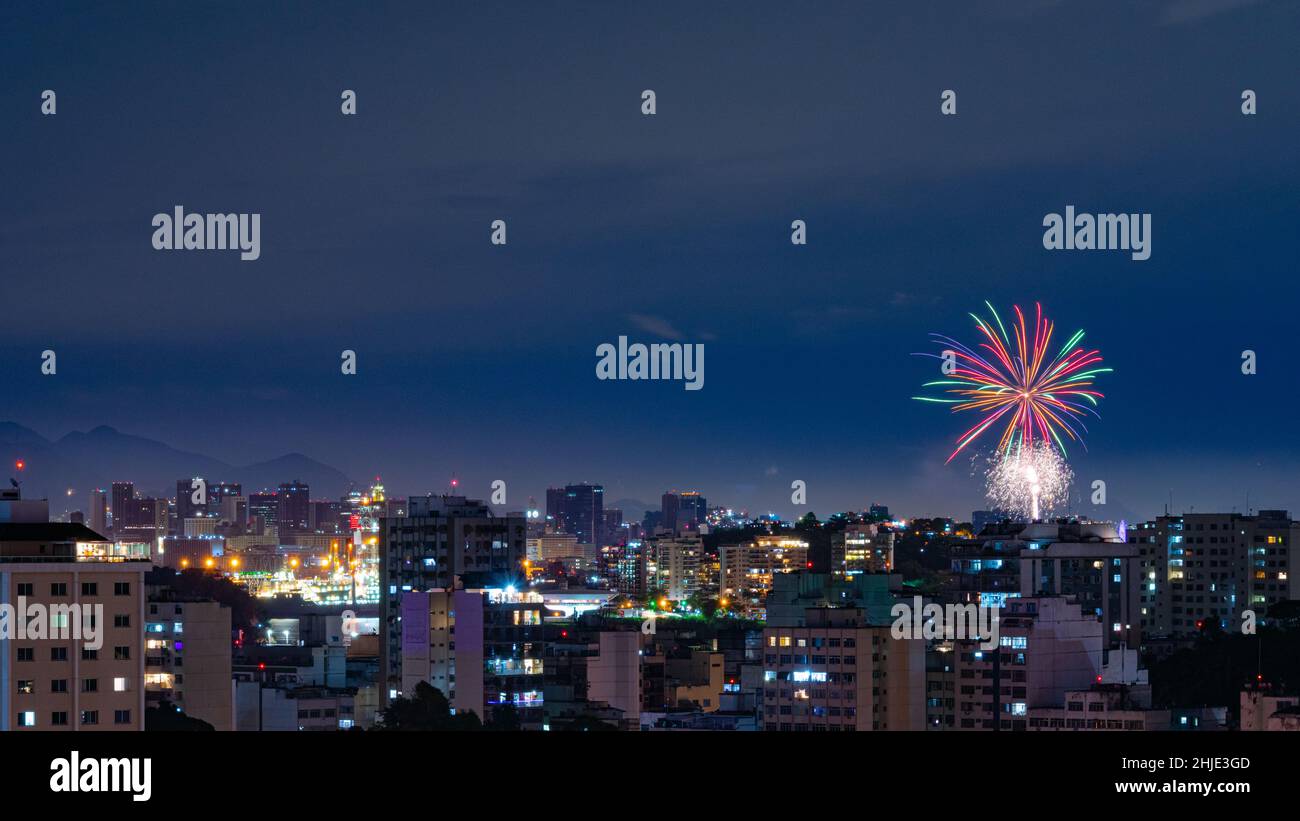 Night images with New Year's (Réveillon) fireworks exploding in the sky