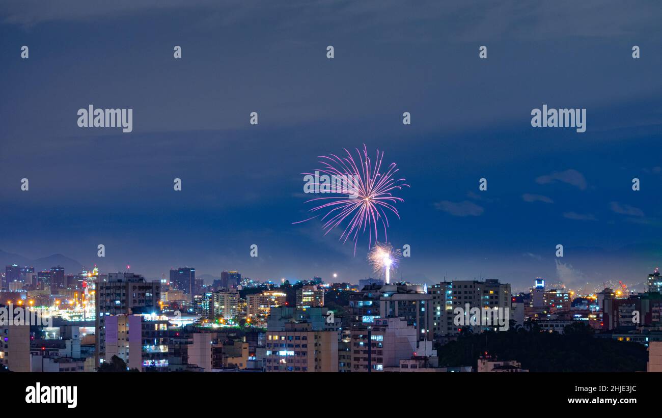Night images with New Year's (Réveillon) fireworks exploding in the sky