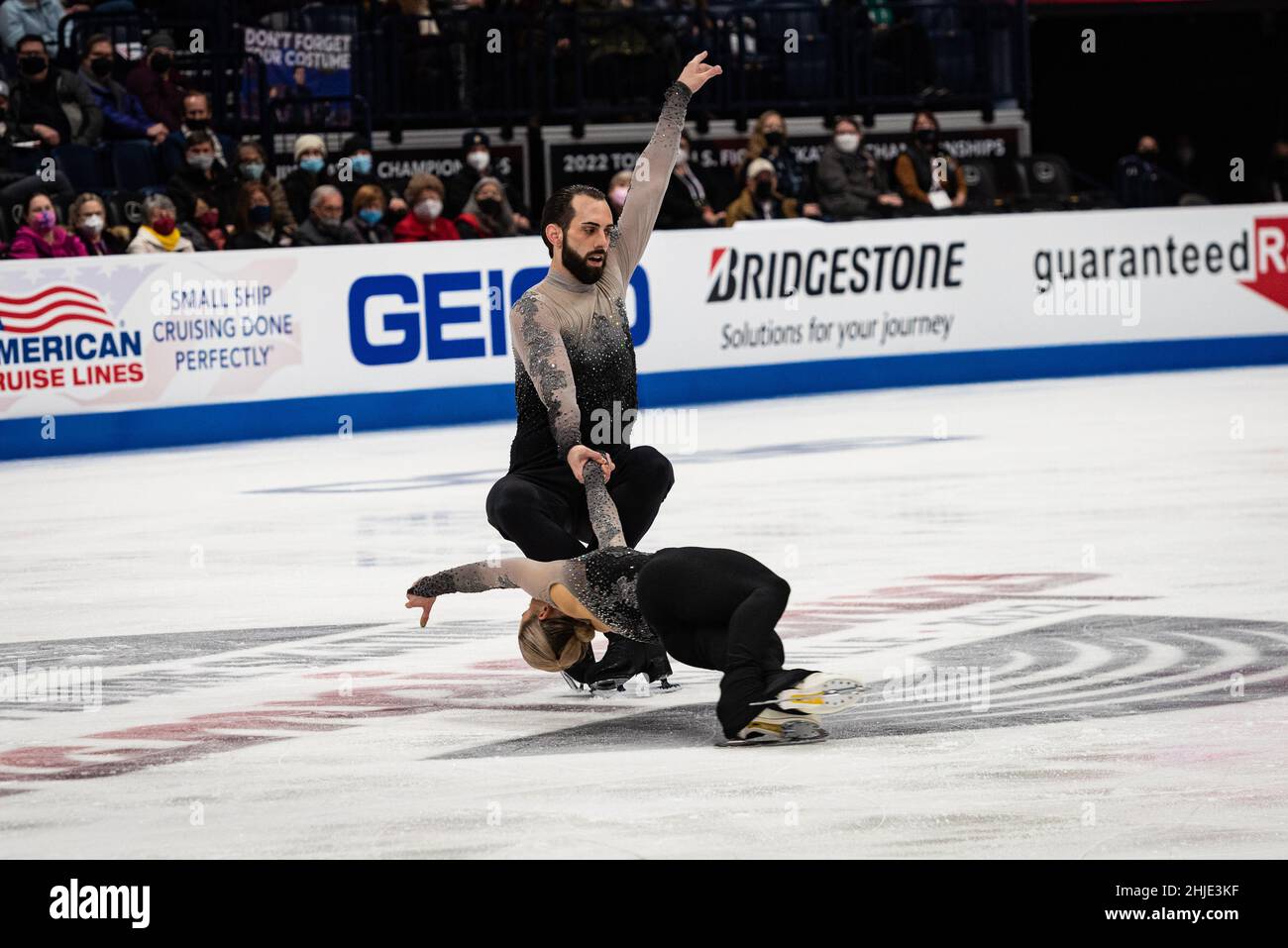 Ashley Cain-Gribble and Timothy LeDuc compete in the free skate that helped them win the gold medal at the U.S. National Figure Skating Championships. Stock Photo