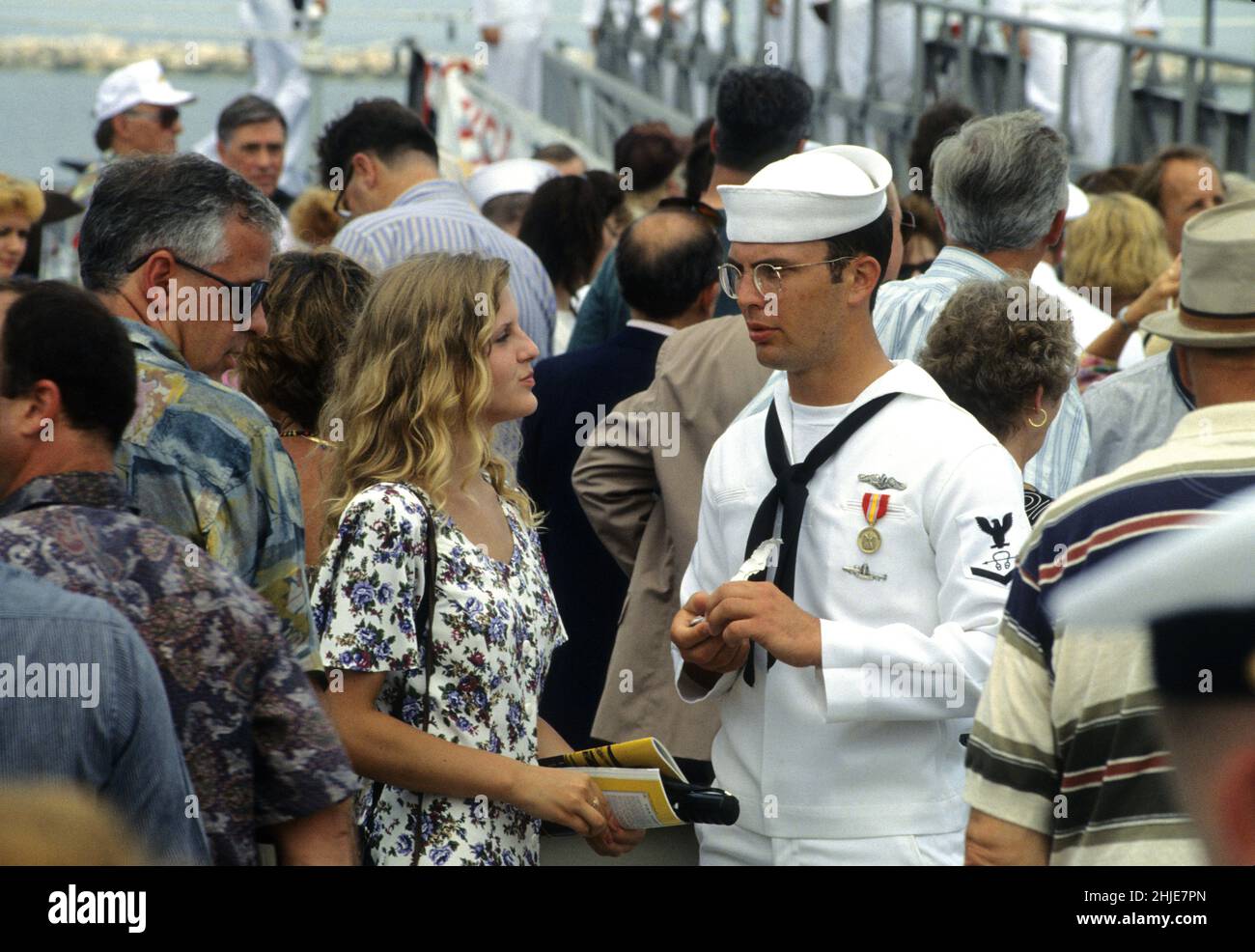 Usa Newport Rhode Island navy Submarine commissioning american military tlking to young woman Stock Photo