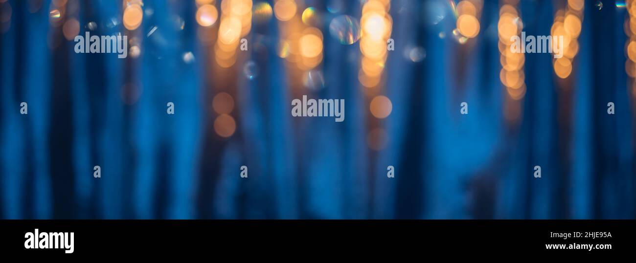 Defocused blue background with warm color bokeh lights Stock Photo - Alamy