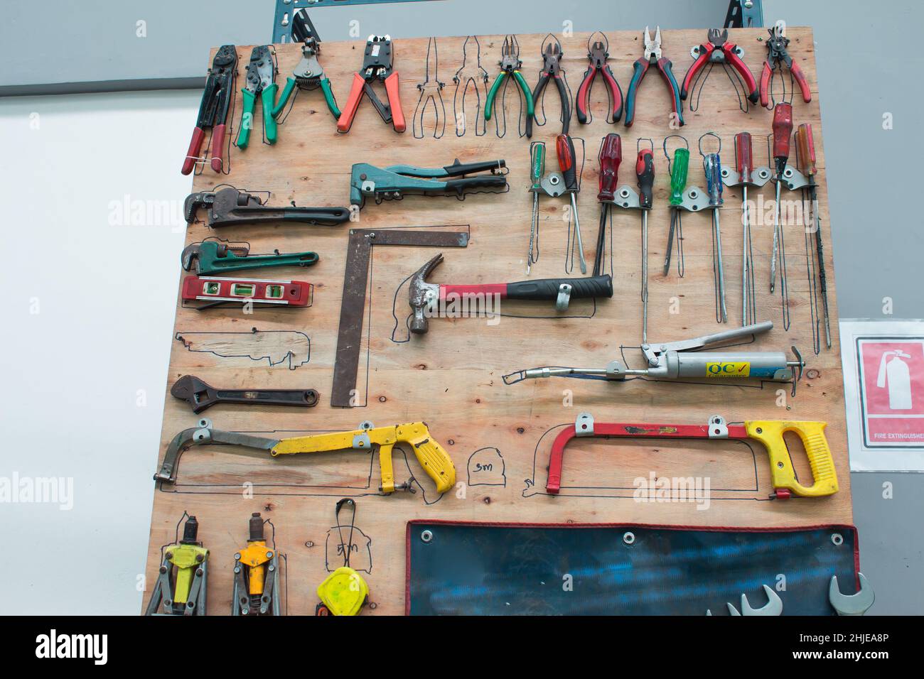 set of tools in tool box on a wooden background Stock Photo