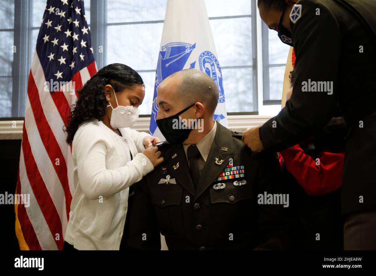 Fort Knox, Kentucky, USA. 20th Jan, 2022. Cecelia Gorini (left), daughter, pins the rank of