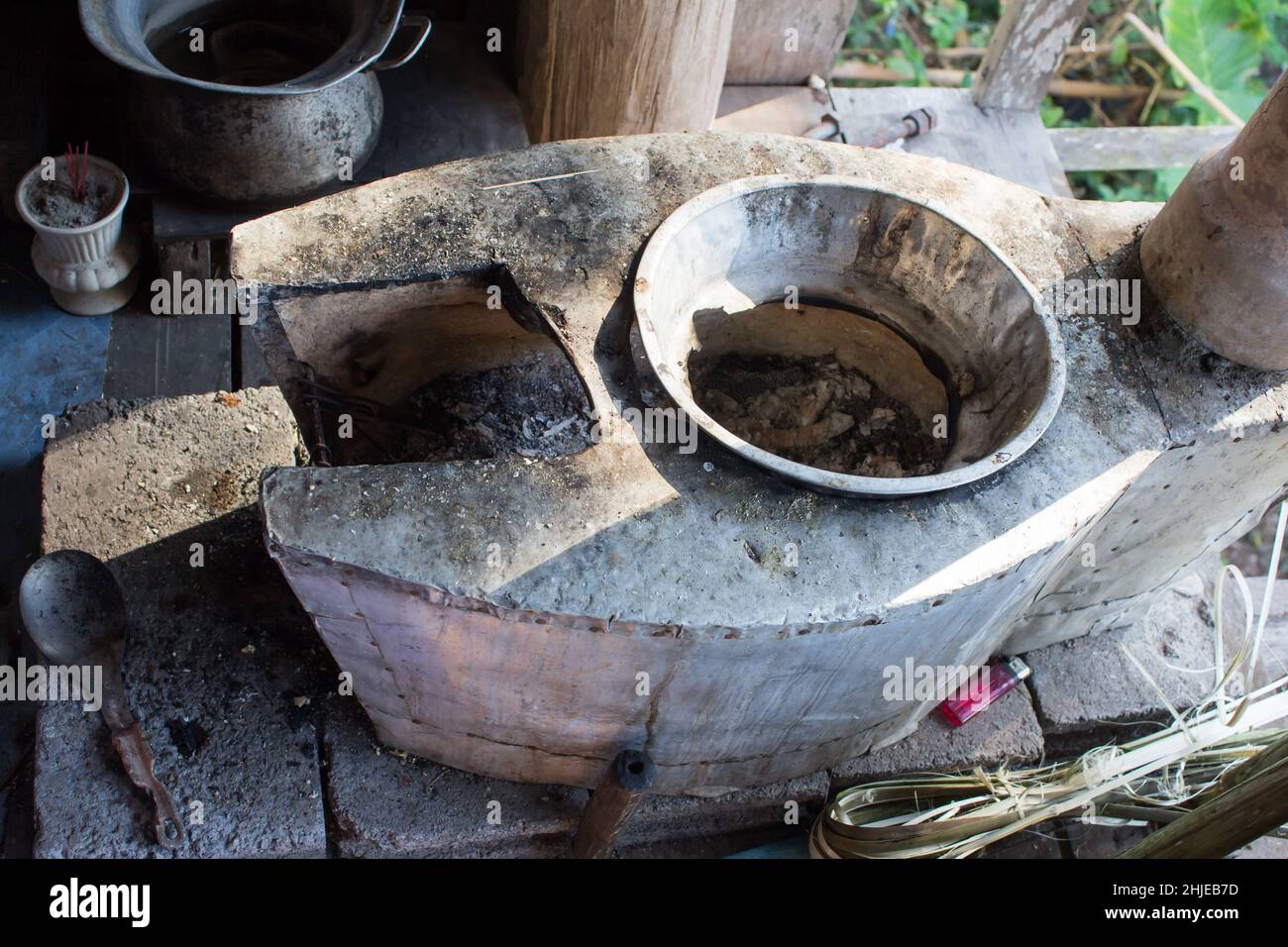 Traditional way of making food on open fire in old kitchen in a village