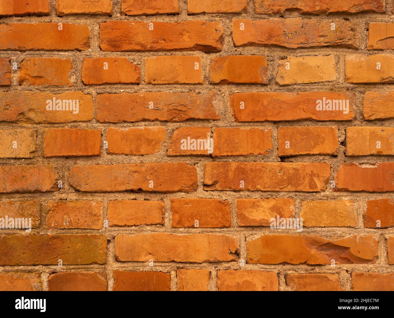 Orange brick wall. Brickwall background, old vintage texture Stock