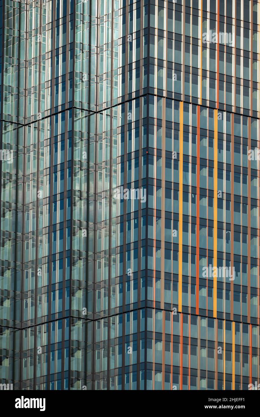 Glass facade of a corporate skyscraper, office financial building abstract exterior background. Stock Photo