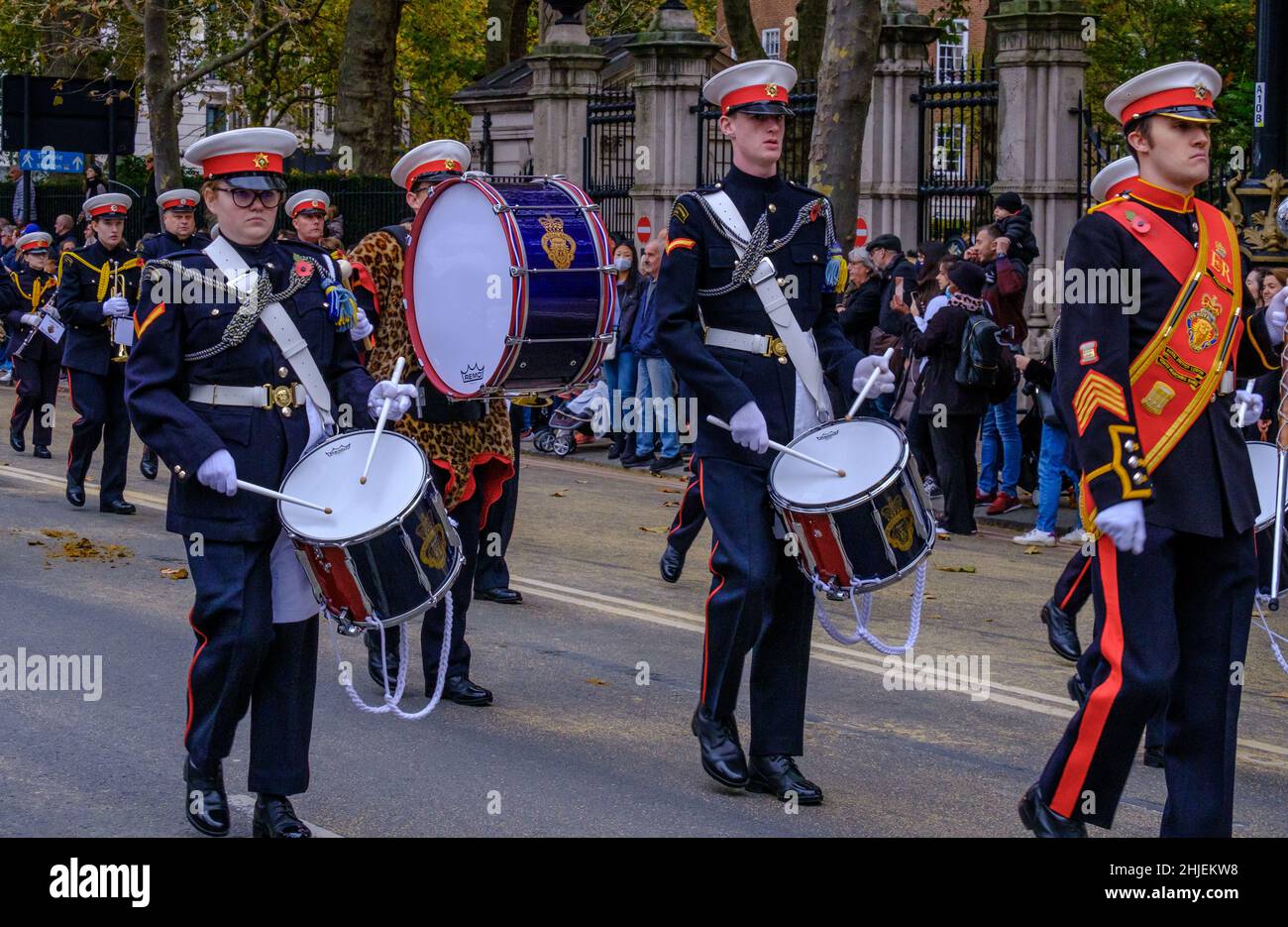 Young people & men play drums marching with the Surbiton Rbl Youth Marching Band at the Lord Mayor’s Show 2021, Victoria Embankment, London. Stock Photo
