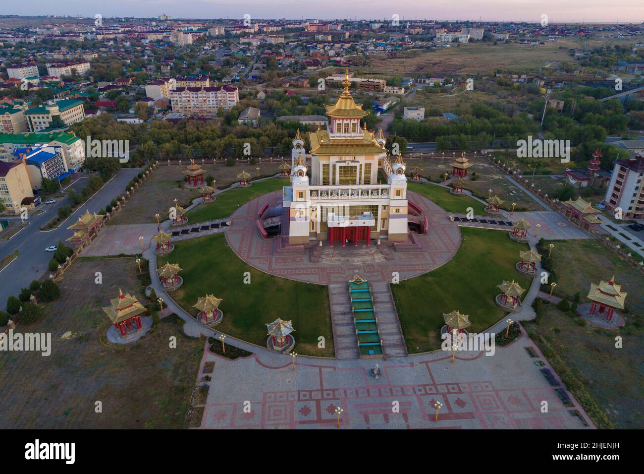 Buddhist temple 'Golden Abode of Buddha Shakyamuni' in the urban landscape on the early September morning (aerial photography). Elista, Russia Stock Photo