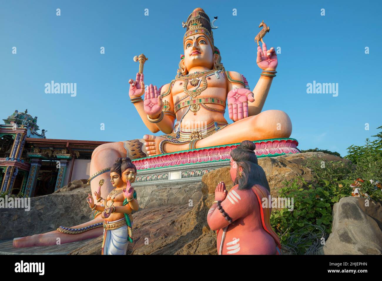 TRINCOMALEE, SRI LANKA - FEBRUARY 08, 2020: At the foot of the statue of Shiva. Hindu temple complex Koneswaram Temple Stock Photo
