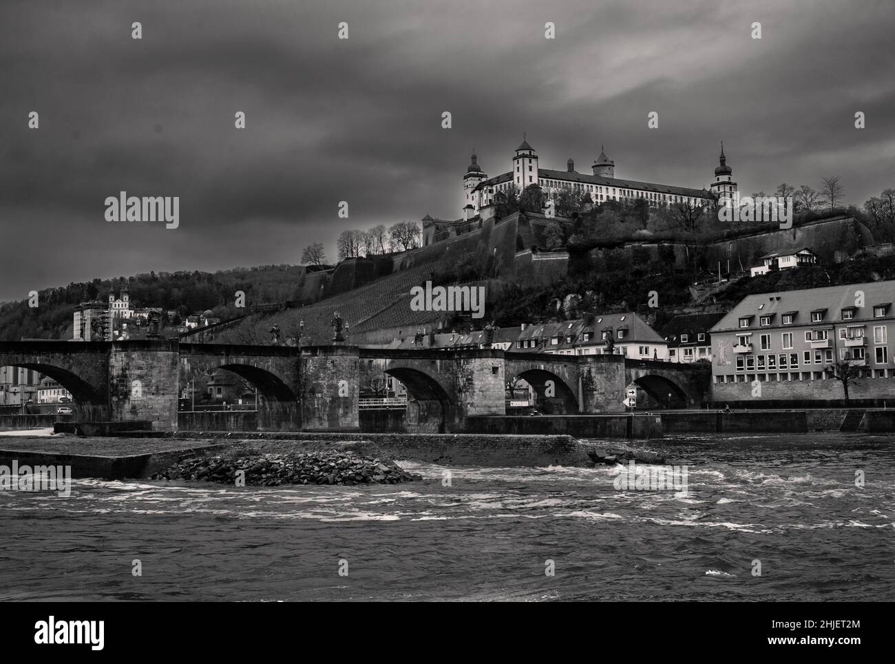 Marienberg Fortress and Old Main Bridge Cityscape in Wurzburg, Germany in Monochrome Black and White Stock Photo