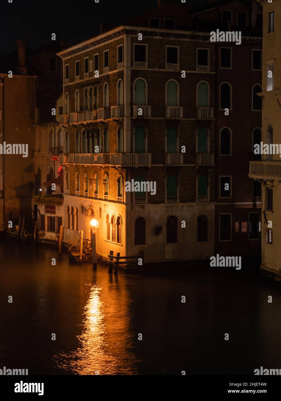 Venice, Italy - January 3 2022: Palazzo Ruzzini Palace on Canal Grande or Grand Canal on a Moody Winter Night Stock Photo