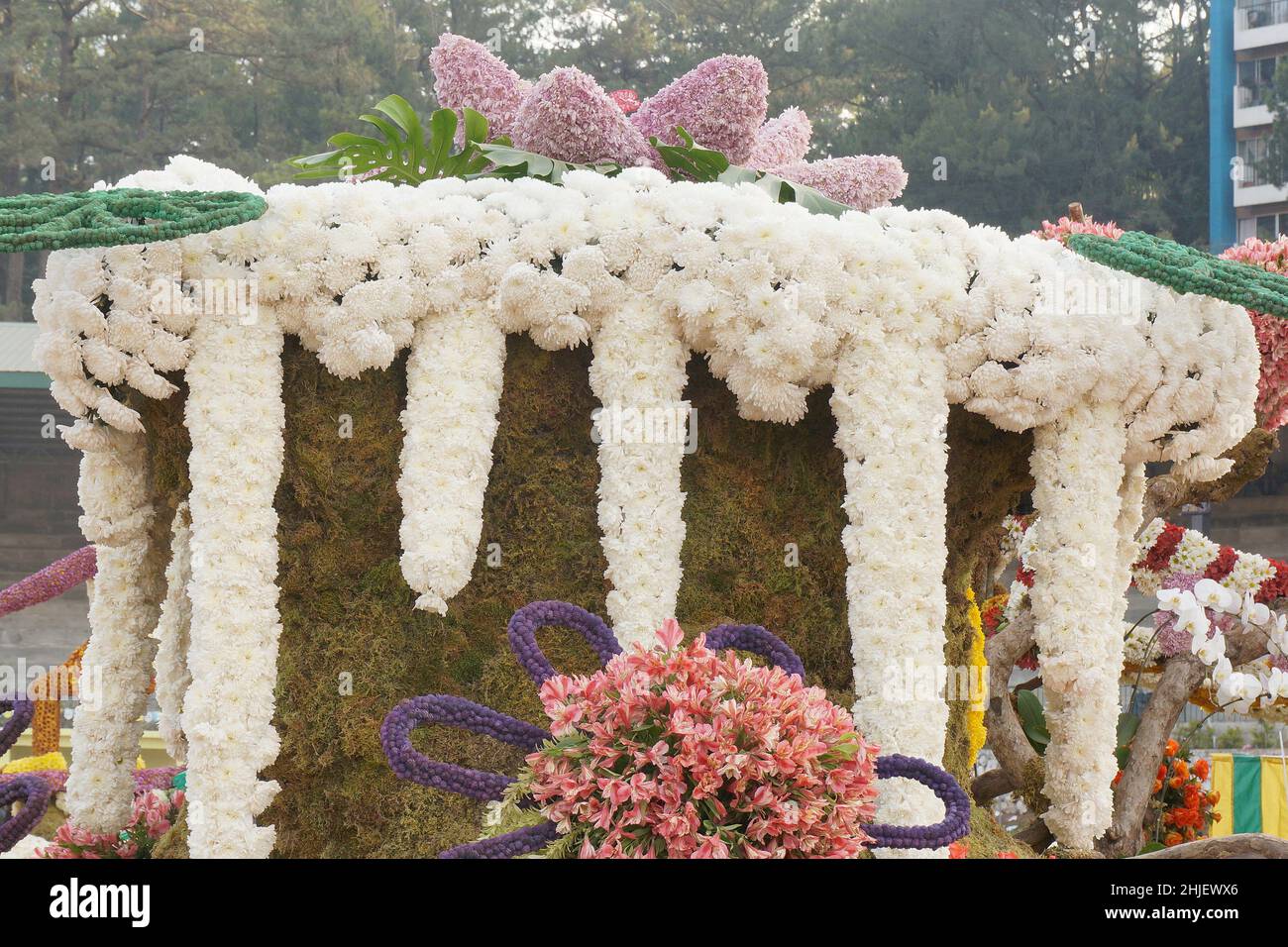Assembled hanging white Chrysanthemum with other decorative flowers displayed at Baguio Flower