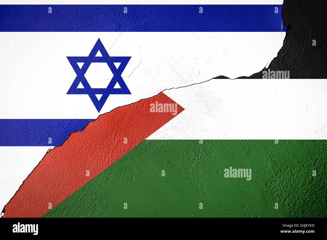 cracked painted wall with Israel and Palestine flags Stock Photo