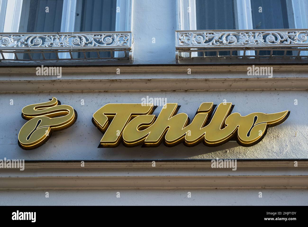 Lubeck, Germany, January 15, 2022:  Tchibo advertising sign on the facade of a store, large global retail chain for coffee and cafes, also online sell Stock Photo