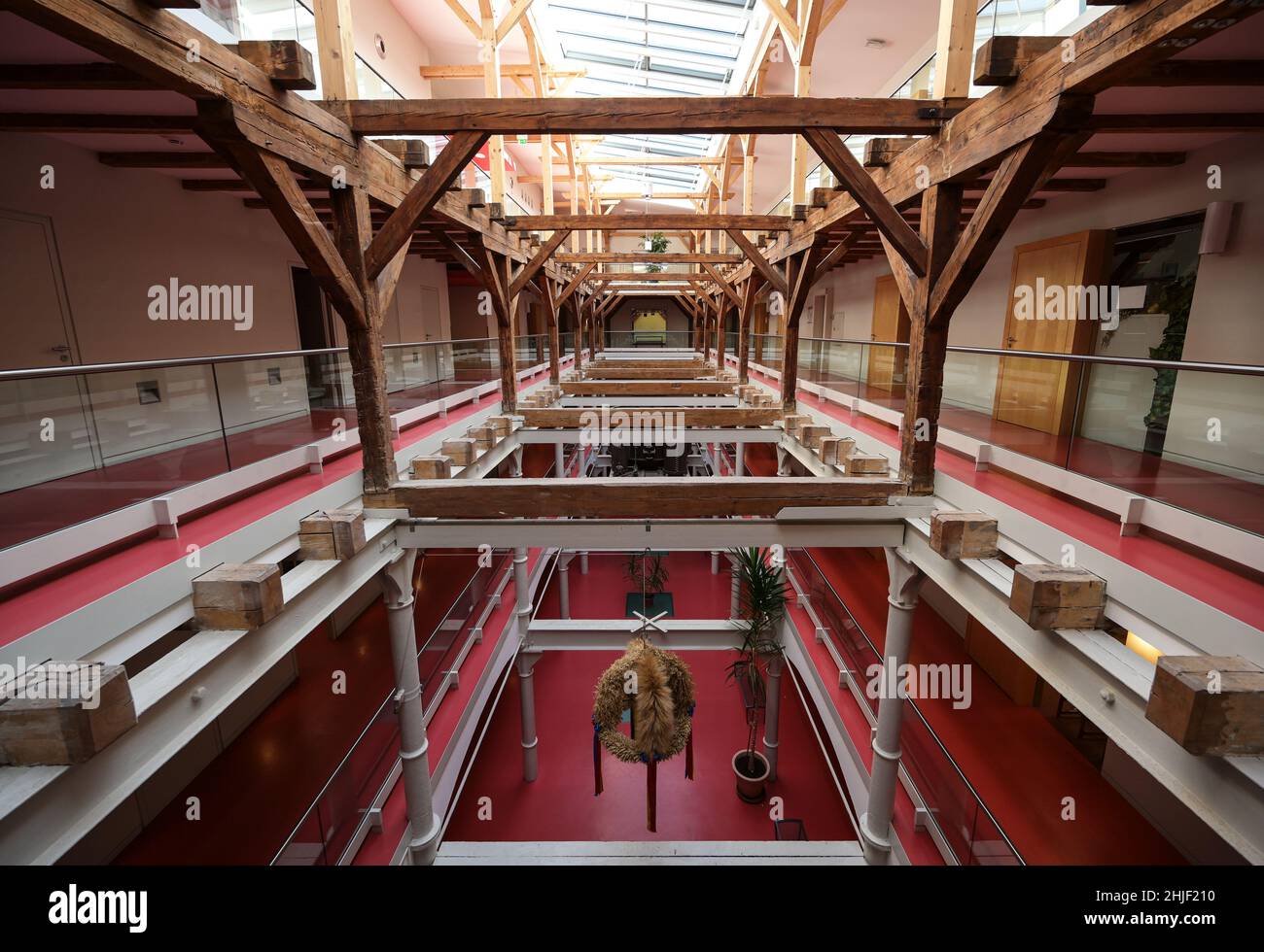 Grevesmuhlen, Germany, September 9, 2020: Inside the historic malt factory of Grevesmuehlen with steel frames and timber construction in open floors f Stock Photo