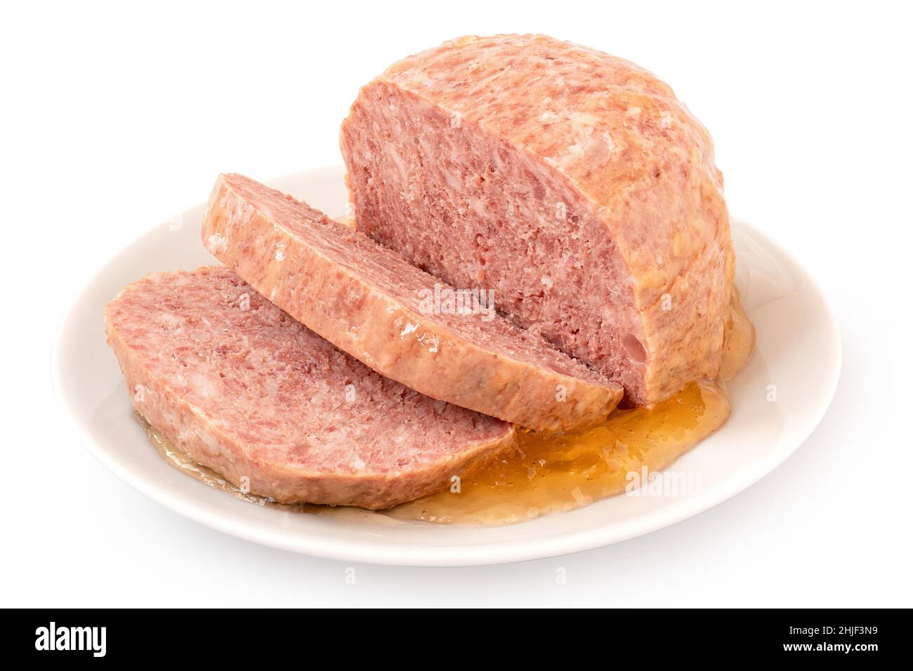 Canned sliced pork luncheon meat surrounded by jelly on white plate