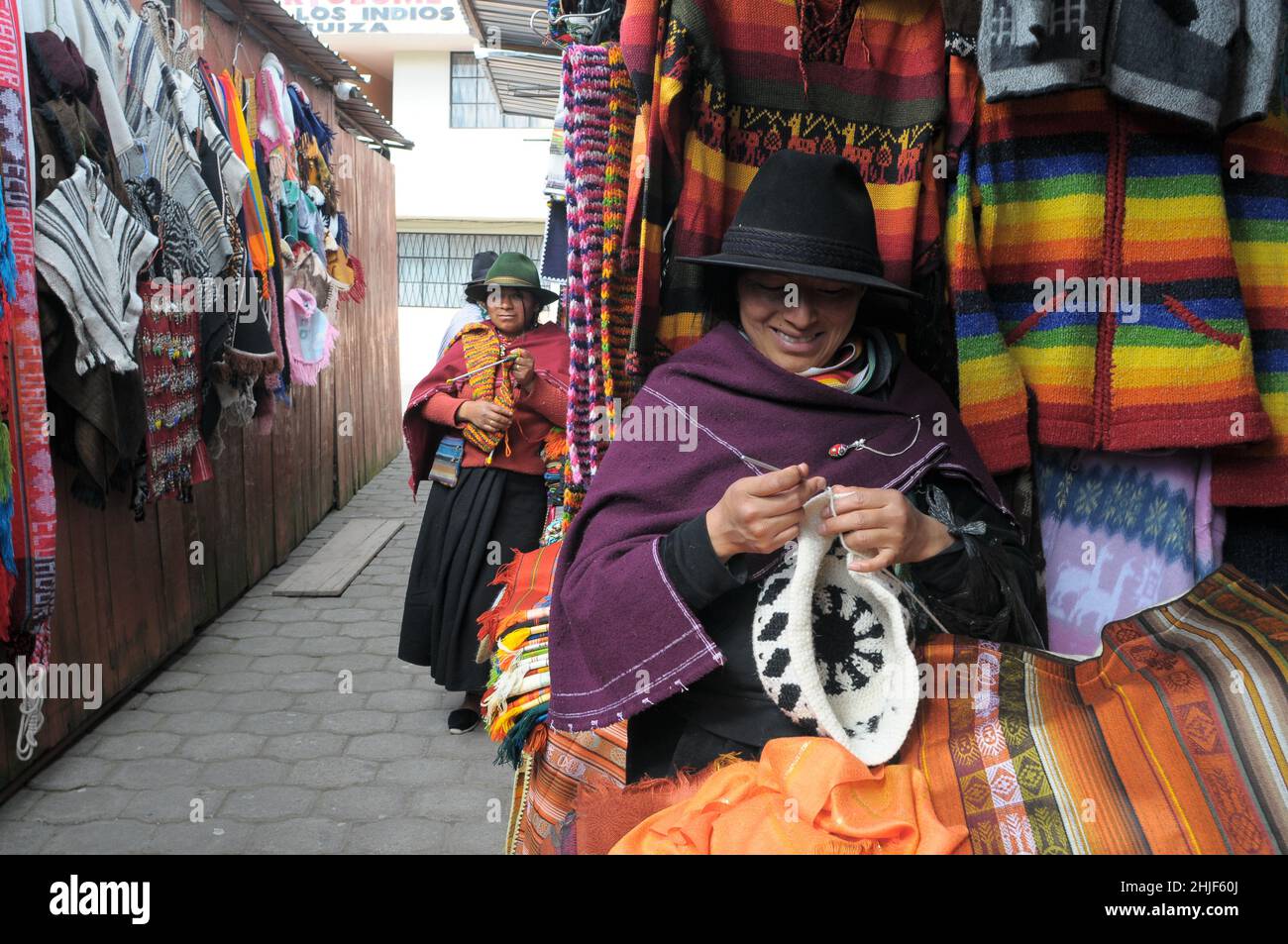 Puhili, Tungurahua / Ecuador - October 24, 2008: Indian woman from the tribe of Puhili knits hats for tourists, Puhili, Ecuador Stock Photo