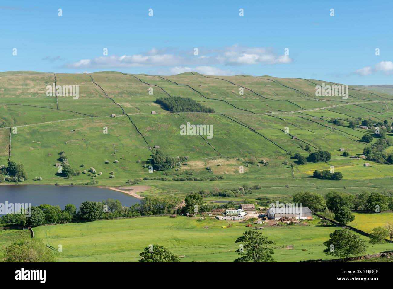 Scenic view of fields and dry stone walls on the hillside above Semer Water in the Yorkshire Dales Stock Photo