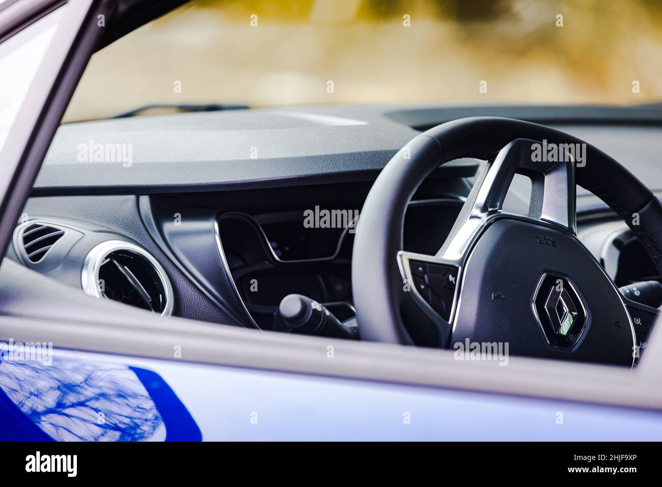 MOSCOW, RUSSIA MARCH 12, 2021 close up of steering wheel of new blue