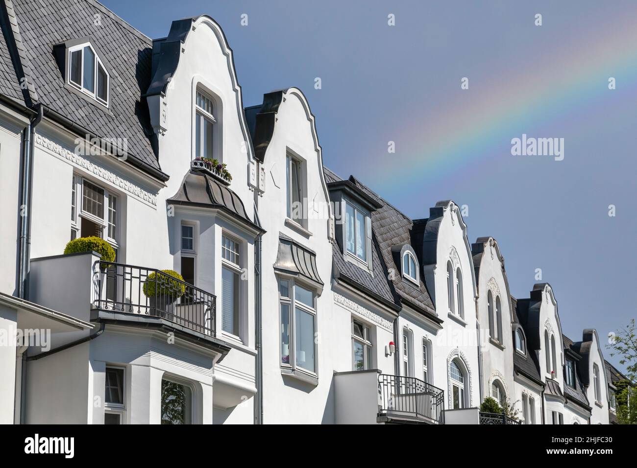 rainbow over hamburg luxury houses Stock Photo Alamy