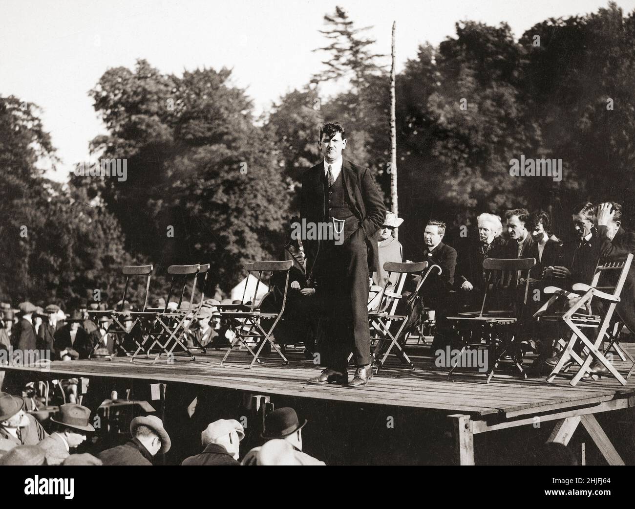 A vintage photograph of Michael Collins (1890-1922), Irish revolutionary, soldier and politician who was a leading figure in the early-20th century struggle for Irish independence speaking in Armagh in 1921. He was Chairman of the Provisional Government of the Irish Free State from January 1922, and commander-in-chief of the National Army from July until his death in an ambush in August 1922, during the Civil War. Stock Photo