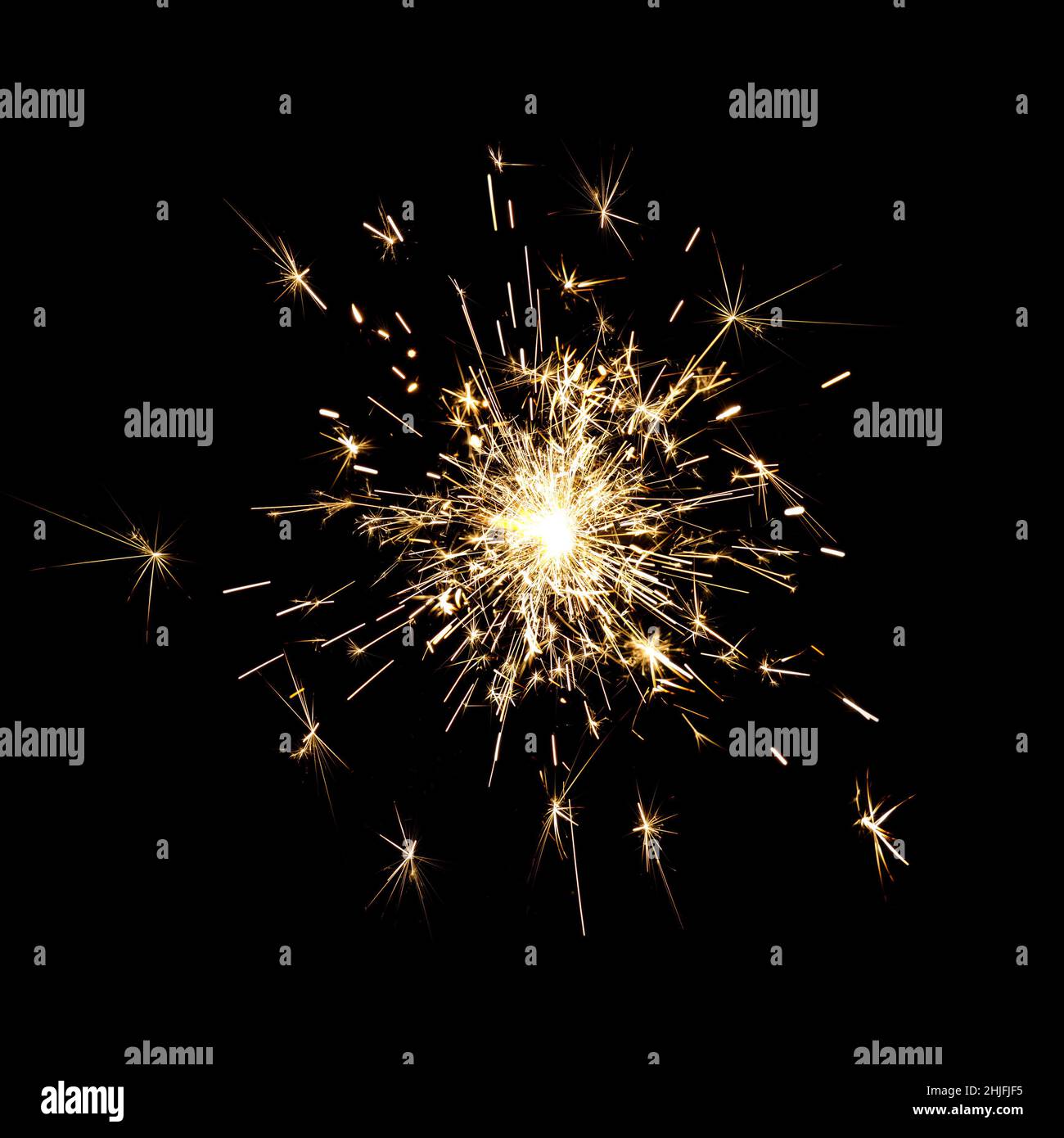 Bright sparks against black background Stock Photo