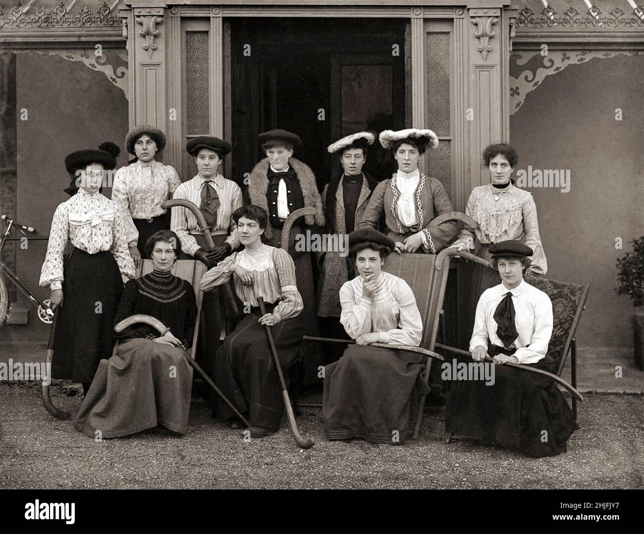 A vintage group photograph of ladies in an unknown Irish team of field hockey players. Shot in 1904. Stock Photo