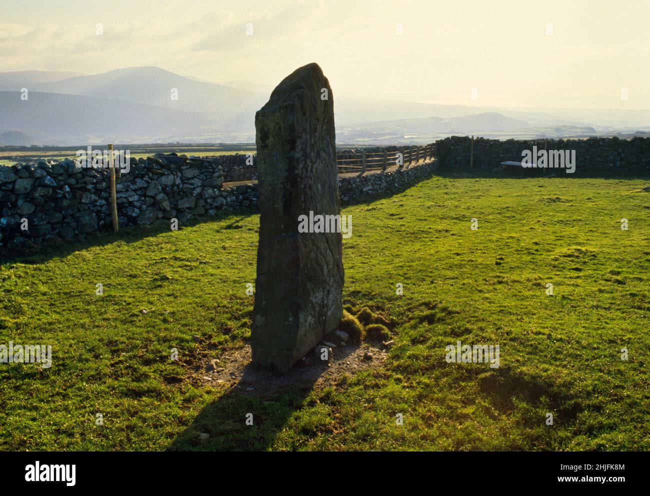 Looking S from Fonlief Hir (Stone A) standing stone near Moel Goedog above Harlech, Gwynedd, Wales, UK, to the mountains & coast of Dyffryn Ardudwy. Stock Photo