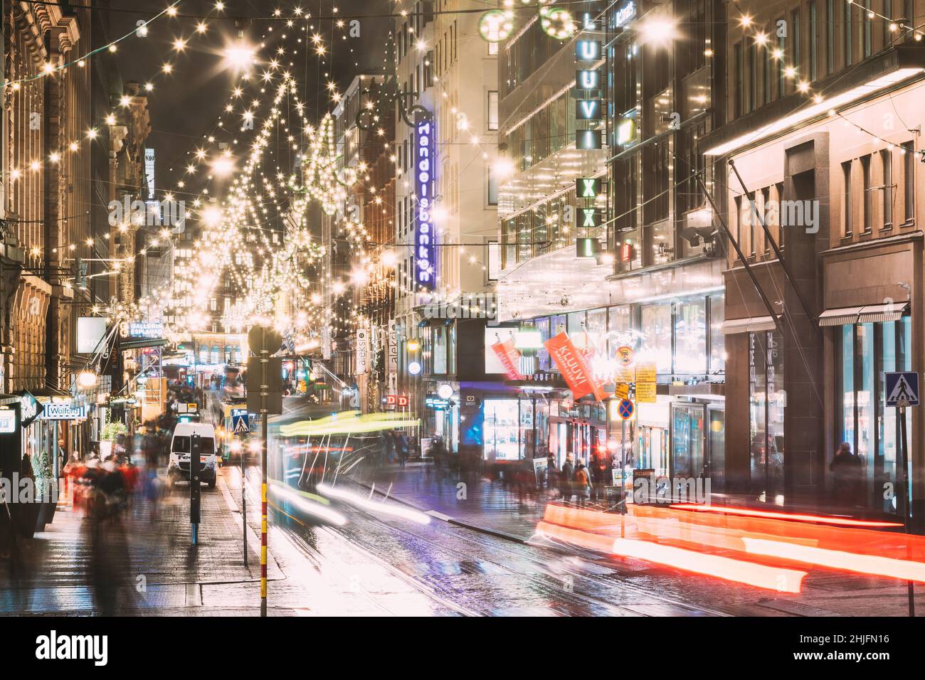 Helsinki, Finland. Night Evening Christmas Xmas New Year Festive Illumination On Aleksanterinkatu Street. Beautiful Street Decorations During Winter Stock Photo