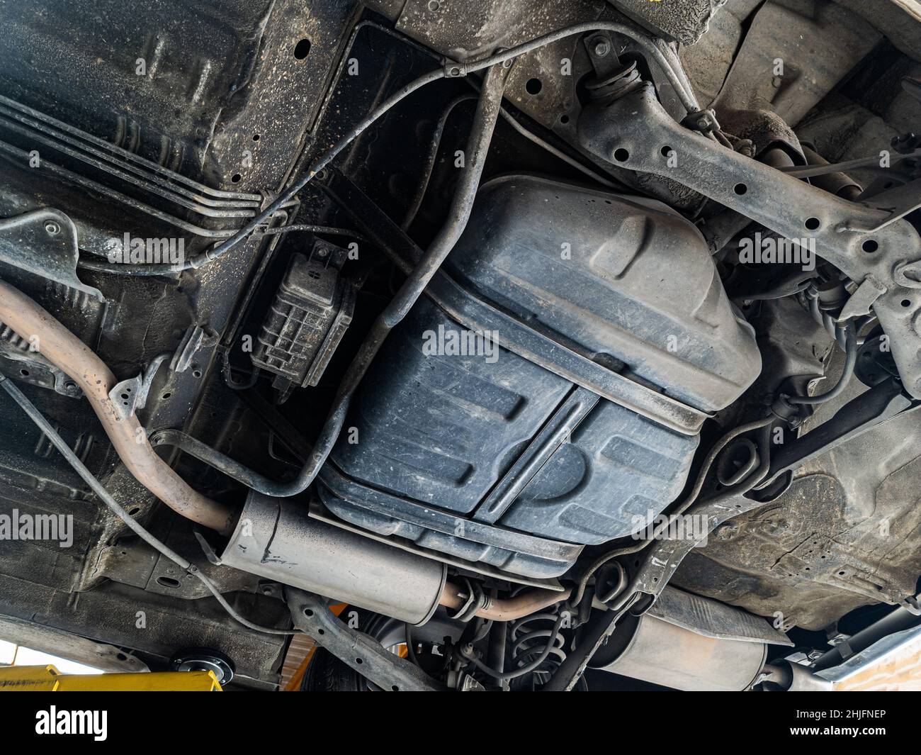 Lifting car engine and suspension system awaiting maintenance in the