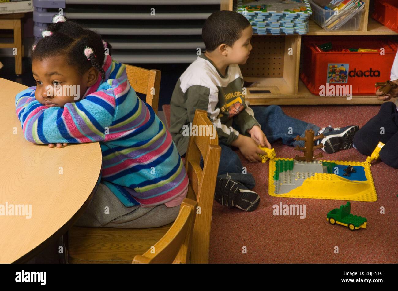 Girl alone in classroom sad hires stock photography and images Alamy