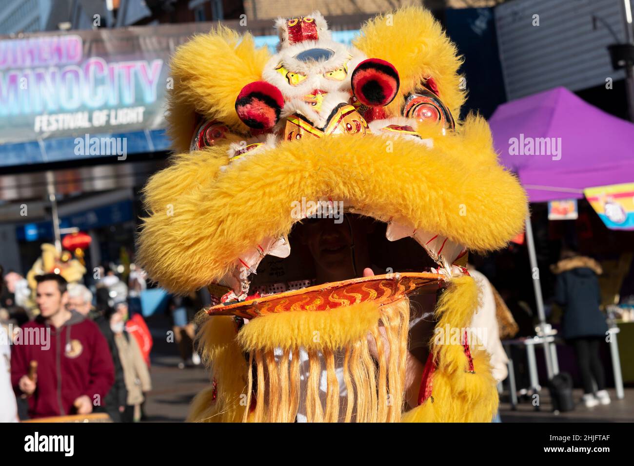 Lion dancers at Chinese New Year 2022, Lunar New Year celebration event in the High Street, Southend on Sea, Essex, UK Stock Photo