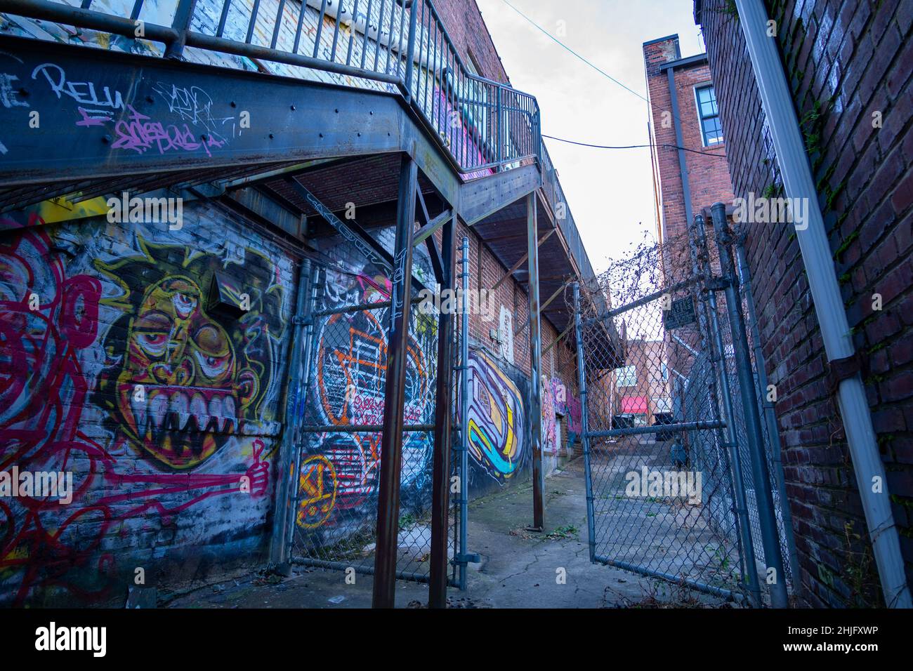 Colorful graffiti adorns an alleyway in Winston-Salem, NC. Stock Photo