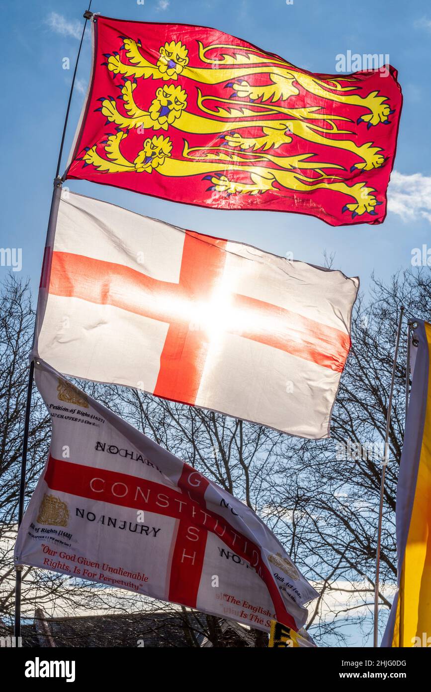 Flags at a English Constitution Party Freedom Rally promoting Graham Moore for the Southend West by-election 2022. Royal Banner of England flag Stock Photo