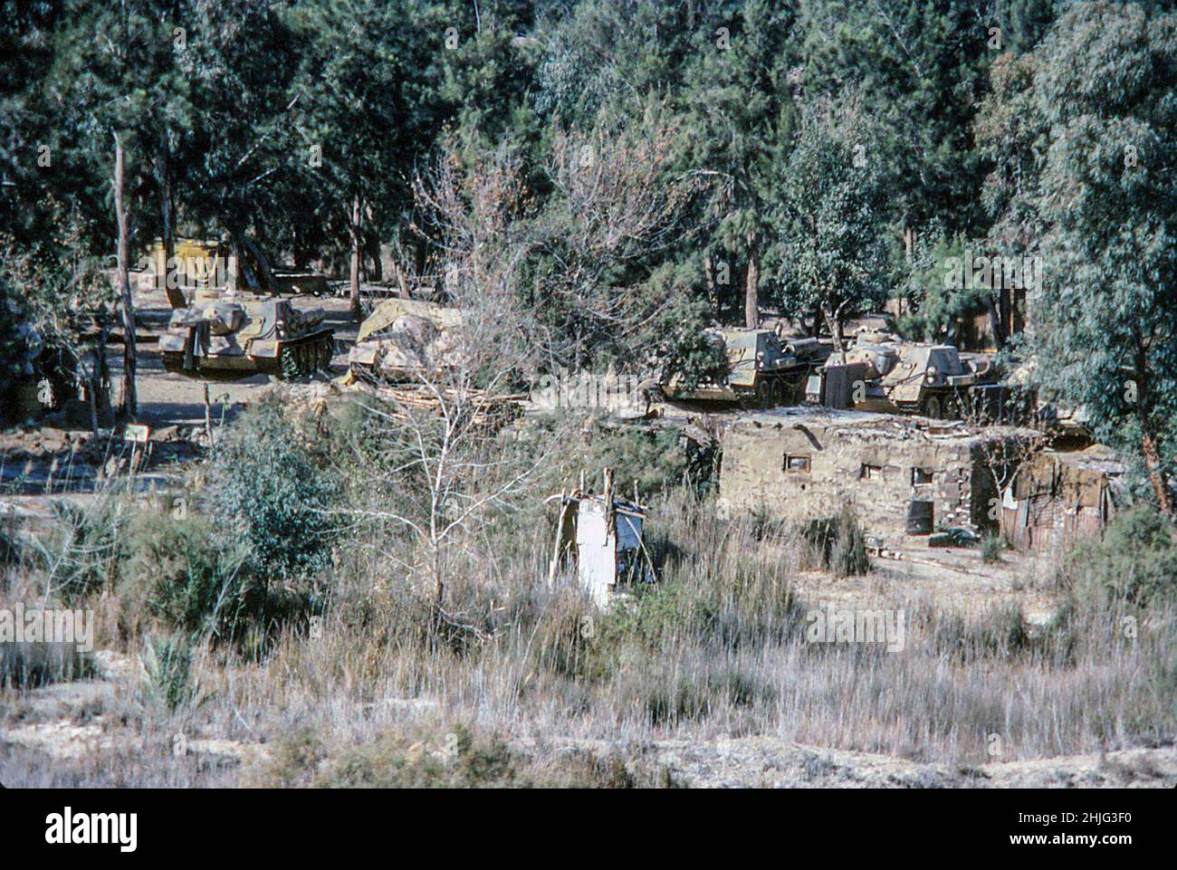 Military tanks alongside the Suez Canal, south of Ismailia, February 1978 Stock Photo