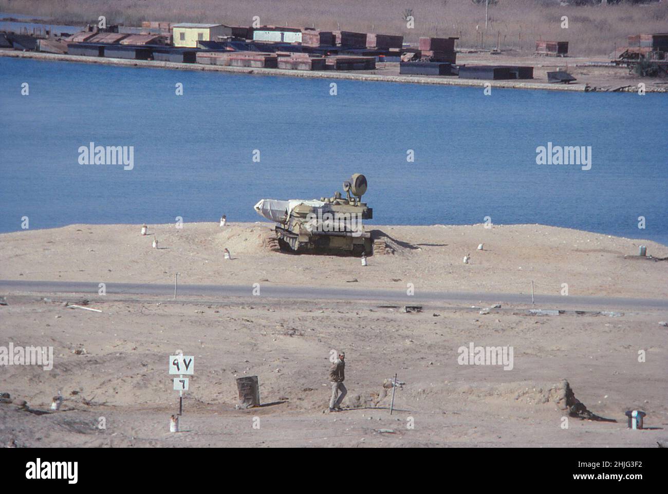 Military tank alongside the Suez Canal, south of Ismailia, February 1978 Stock Photo