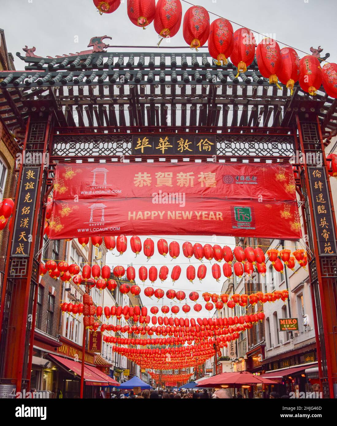 London, UK. 29th Jan, 2022. New red lanterns and 'Happy New Year' signs decorate London's Chinatown ahead of the Lunar New Year. This year will be the Year Of The Tiger. Credit: SOPA Images Limited/Alamy Live News Stock Photo
