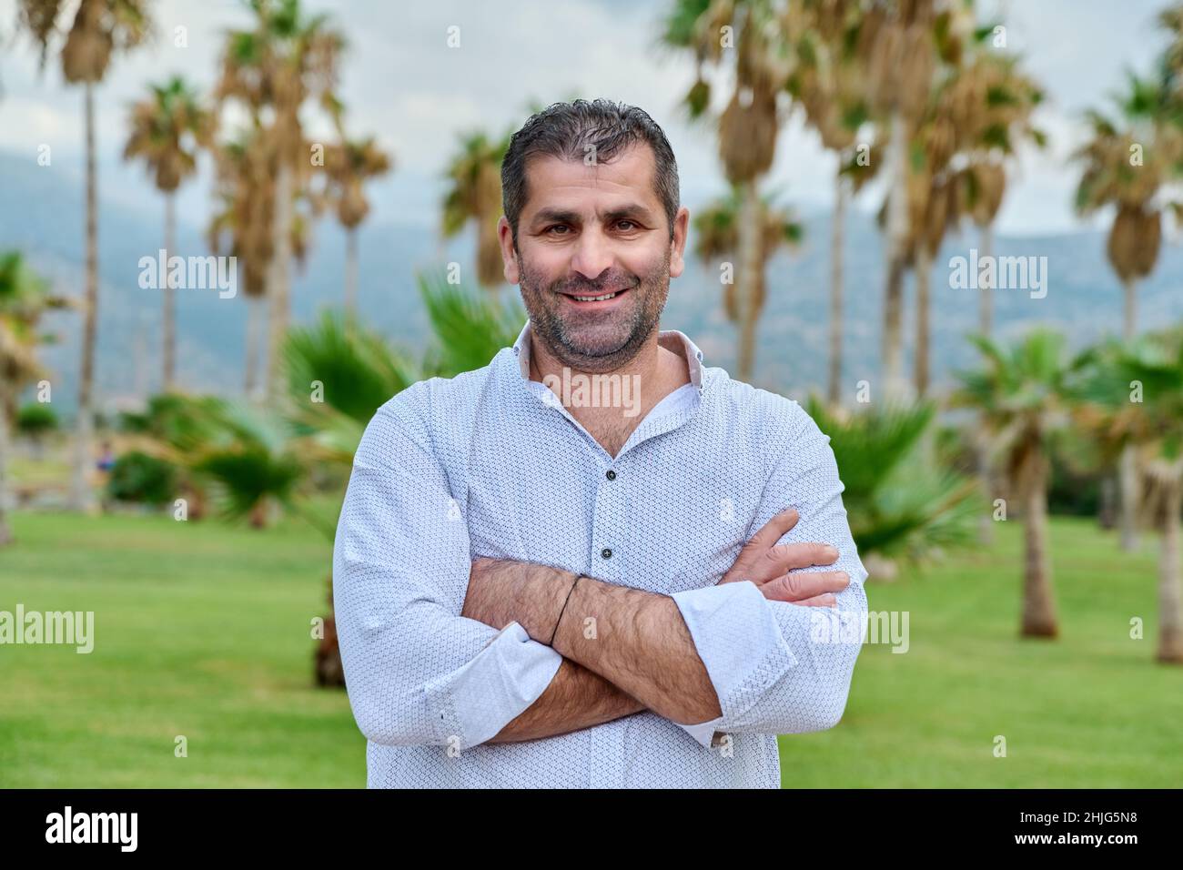 Outdoor portrait of mature confident man looking at camera Stock Photo