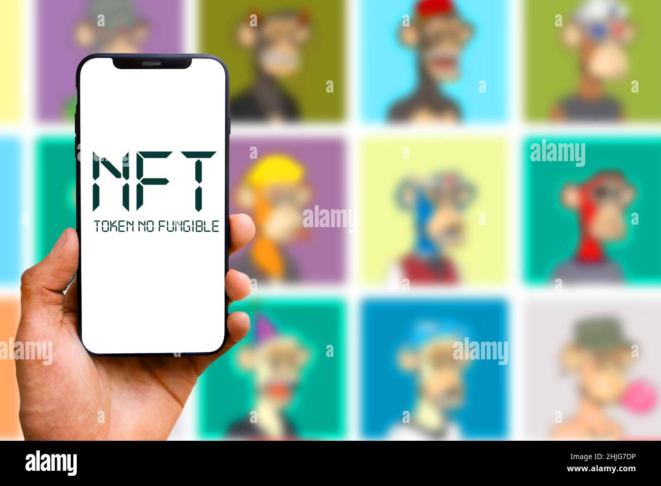 Smartphone with the acronym “NFT” logo refers to a nonfungible token