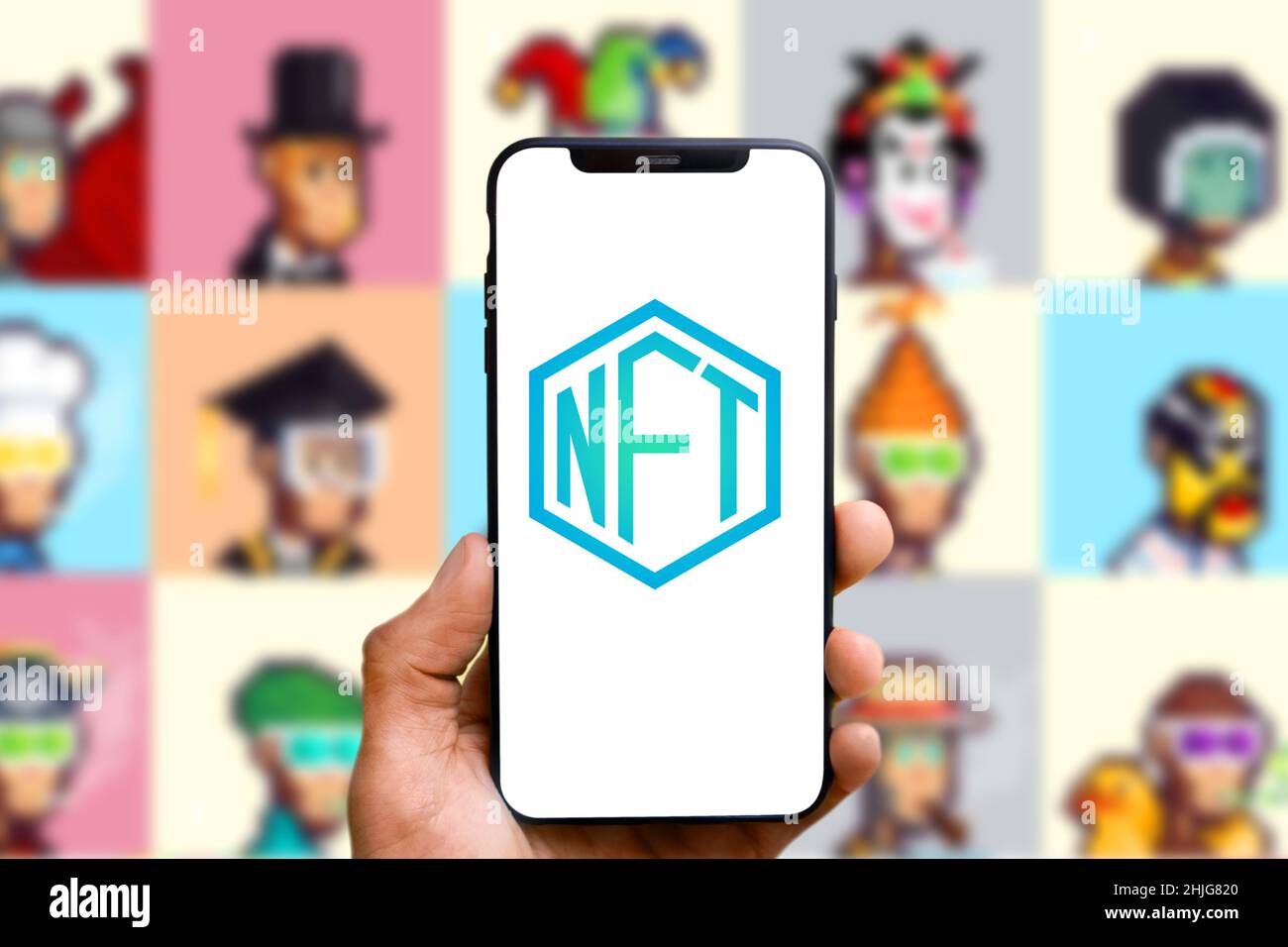 Smartphone with the acronym “NFT” logo refers to a nonfungible token