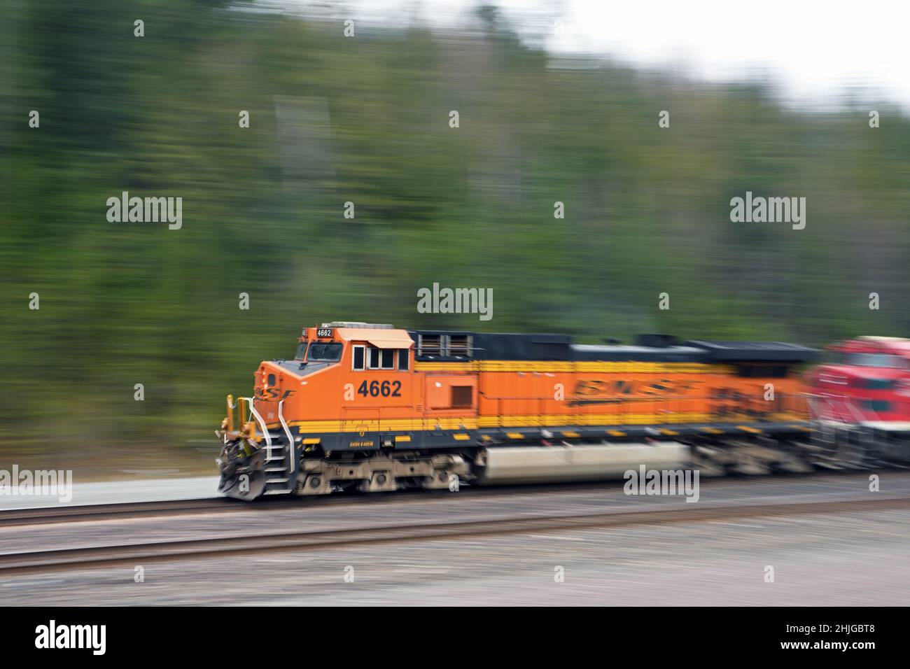 Burlington Northern Santa Fe train engine 4662 traveling down the Northern Transcon route that runs from Seattle to Chicago. Near Troy, Montana. Stock Photo