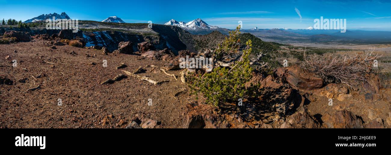 Panoramic image from Central Oregon's Tam McArthur Rim with Broken Top, the Sisters, Mt. Washington, Three Finger Jack, Mt. Jefferson, and Mt Hood in Stock Photo