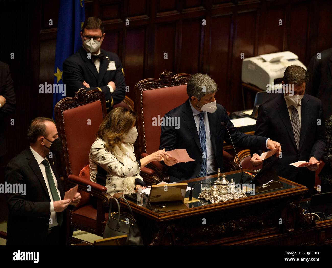 Rome, Italy. 29th Jan, 2022. Maria Elisabetta Alberti Casellati (2nd L, Front), president of the Italian Senate, and Roberto Fico (2nd R, Front), president of the Italian Chamber of Deputies, count ballots during the eighth round of voting to elect Italy's new president in Rome, Italy, on Jan. 29, 2022. Italian President Sergio Mattarella was elected to a second term by the parliament gathered in a joint session in the eighth round of voting on Saturday. Credit: Str/Xinhua/Alamy Live News Stock Photo