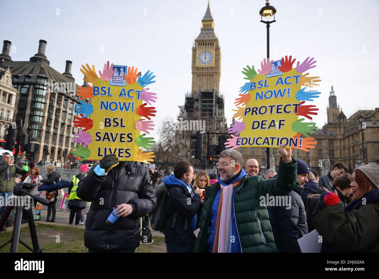 Protesters seen holding placards expressing their opinion during the demonstration. British sign language and deaf community rallied opposite the U.K. Parliament in support of BSL (British Sign Language) bill which recognises sign language as an official language of the United Kingdom. Stock Photo